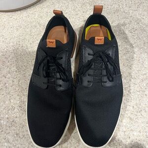 Sleek Black Men's Shoes with Tan Accents